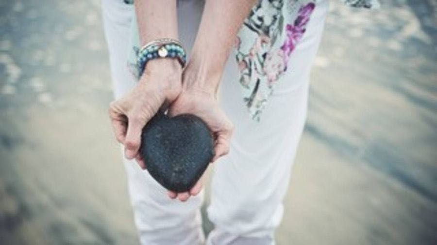 Heart-shaped rock on the beach